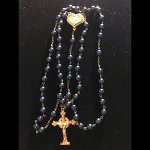 Hand made rosary blue with gold cross and emblem